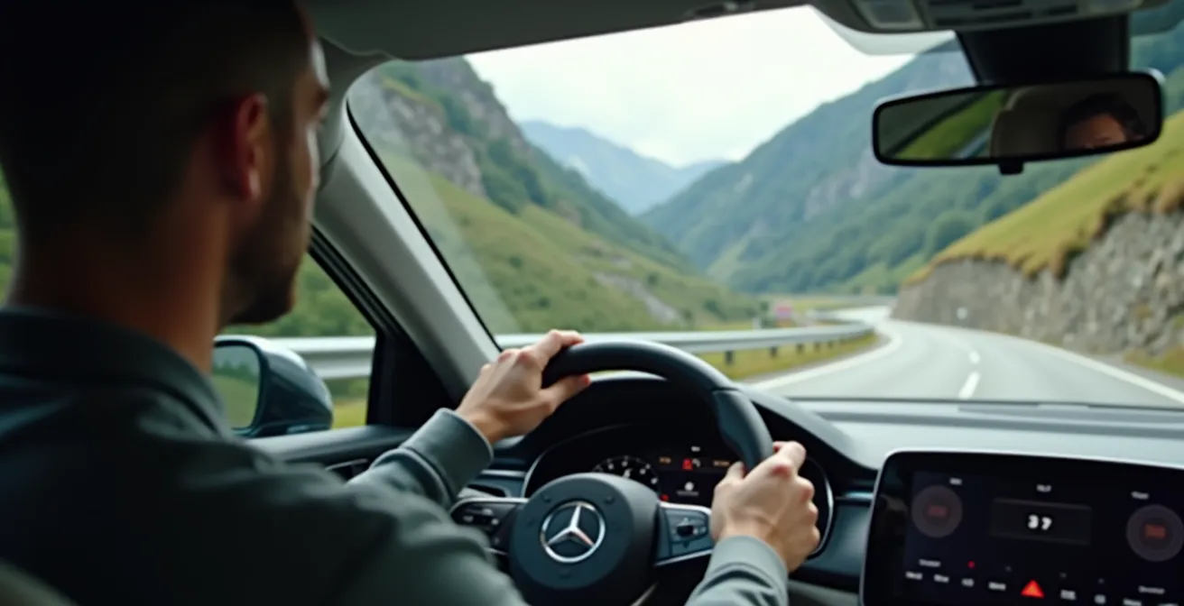 Fahrer übernimmt Kontrolle von Assistenzsystem auf kurviger Bergstrasse